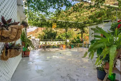 Image de Appartement \"Lugar Tranquilo\" avec vue sur les montagnes, terrasse privée et Wi-Fi.