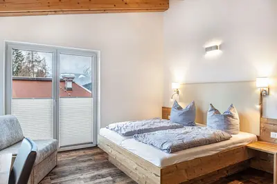 Appartement de vacances Wetterstein avec vue sur les montagnes, balcon et Wi-Fi.