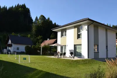 Image de Ferienhaus mit GroĂźer Terasse