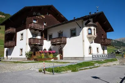 Image de Appartement de vacances \"Casa Li Roina n 46\" avec vue sur les montagnes, balcons et Wi-Fi.