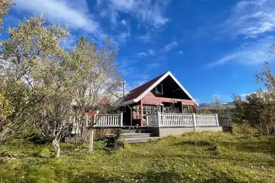 Image de Northern Lights Cabin. Quiet location next to the river. Sublime Mountain views
