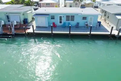 Oceanside waterfront 2/2 home with 55ft dock and paddle equipment