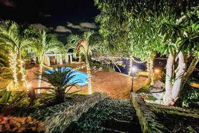 Image de 5 Ensuite Bedrooms with Saltwater Pool and Stunning Views on Lush Tropical Grounds