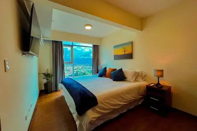 Image de Relaxing Apartment in Latitud Yoses 21st floor Ac/ Wifi