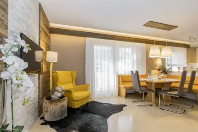 Image de Appartement de vacances \"Apartment Wieser 2\" avec vue sur les montagnes, piscine chauffée et Wi-Fi.