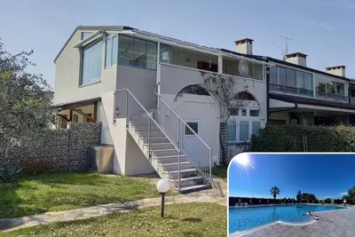 Image de Appartement de vacances Colà pour 1 - 7 personnes avec 3 chambres à coucher - Appartement de vacance