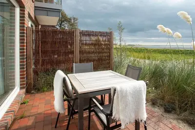 Image de Family and dog-friendly modern vacation apartment with south-facing terrace on the mudflats