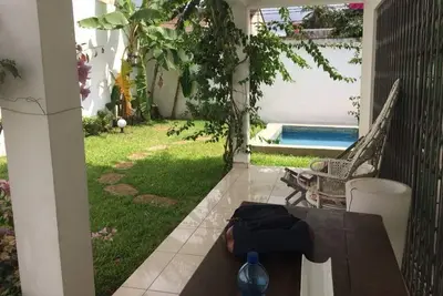 Image de Maison individuelle avec jardin et un parking intérieur