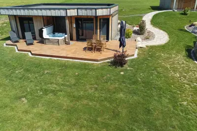 Image de Ecolodge le Cerf avec spa privatif au domaine Nature Cottage Vosges