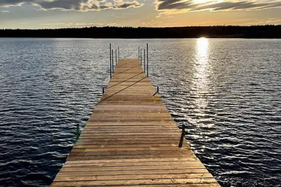 Image de Maison en bord de l’eau directement sur la rivière Mira