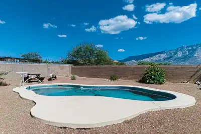 Image de Captivating desert home with private pool, game room, grill, backyard & W/D