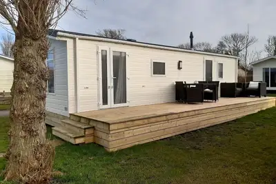 Image de Chalet au bord de la Mer des Wadden avec Jardin