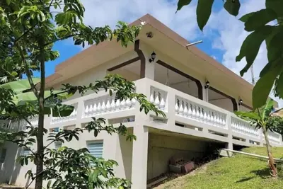 Image de Charming and Cozy House in P. R 8 min to Rainforest