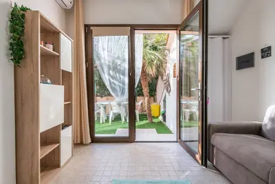 Image de Maison de vacances \"Casa Clà\" avec vue sur les montagnes, jardin et climatisation.