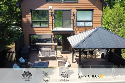 Image de Aux 4 Foyers | Spa & Vue Wow | Kayak & Pédalo