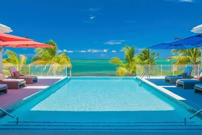 Kaia Kamina: Ultra Luxe Beachfront Estate in Cayman Kai