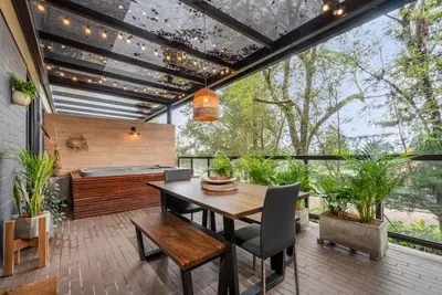 Image de Jacuzzi privado en terraza con Bbq Alto Palmas