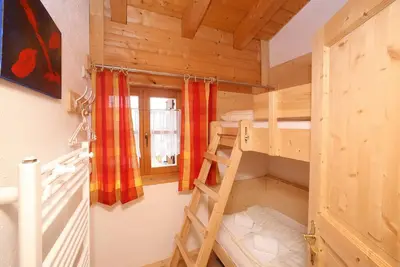 Image de Staudi's ski hut vacation apartment Top4 in hut style directly on the slopes Stove