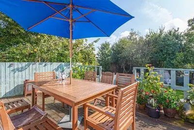 Image de A coastal property that sleeps 8 guests in 4 bedrooms