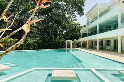 Image de Ground floor studio with pool, steps from sandy beach! Ac/WiFi/Tv/parking