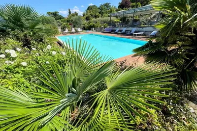 Image de Apt 5 Climatisation, Wifi, piscine à débordement, jacuzzi, jardins Incroyable! Capacité d'accueil : 4 personnes
