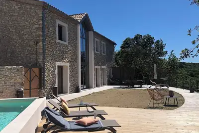 Image de Demeure en pierre avec vue exceptionnelle, piscine et spa privatifs