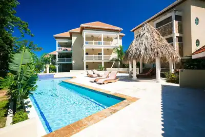Image de Out our door onto the sand and into the water, luxury condo and Large Patio in Lawson