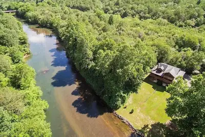 Image de Astounding River View - New Listing! Luxurious Cabin with Direct River Access and Views