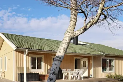 Image de Maison de vacances pour 8 a Mellbystrand-By Traum