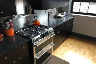 Image de Modern Luxury Loft in Downtown Providence w/Private Garden, Fire Pit & Bbq Grill