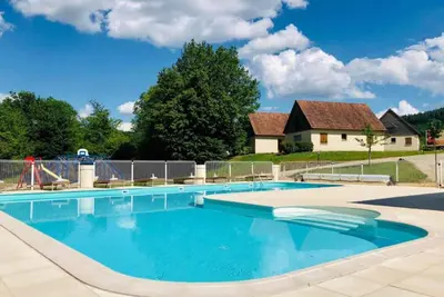 Image de Maison dans un parc de vacances avec piscine