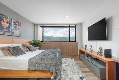 Image de Go Living 1219 · Stunning loft, kitchenette, Ac, Gym and co-work