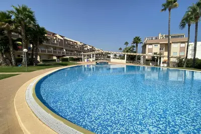 Image de Appartement au rez-de-chaussée pour 4 personnes avec piscine, terrain de paddle
