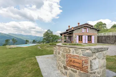 Image de Appartements \"Serrino Family\" avec vue montagne, piscine partagée et Wi-Fi