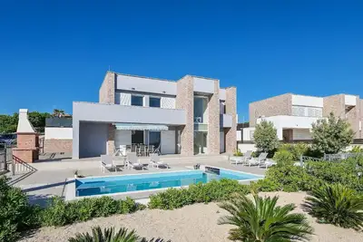 Image de Maison de vacances Novalja pour 1 - 10 personnes avec 4 chambres à coucher - Maison de vacances
