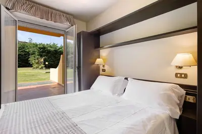 Image de Appartement \"Loano2 - Bilo Terra in Villaggio\" avec jardin privé, piscines partagées & Wi-Fi