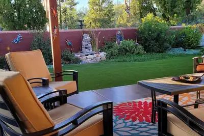 Image de Luxurious Backyard Living at charming Adobe brick home