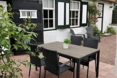 Image de Cozy farmhouse, Zeeland, original, large garden, wallbox 22kw