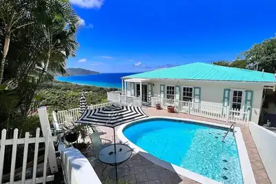Image de Quiet hillside villa with expansive sea, beach, and mountain views. . .