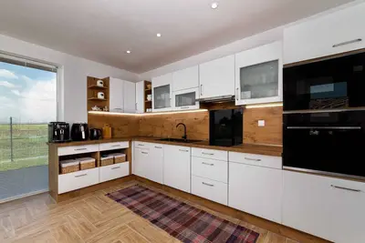 Image de Maison de vacances Climatisé, avec lave-linge, lave-vaisselle et WiFi