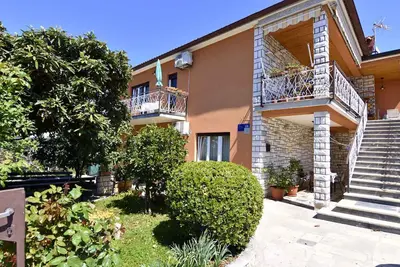 Image de Appartement de vacances avec jardin près de la mer