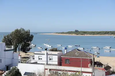 Image de ÁTICO Costa DOÑANA - Apartment with spectacular views of the Doñana reserve and free Wi