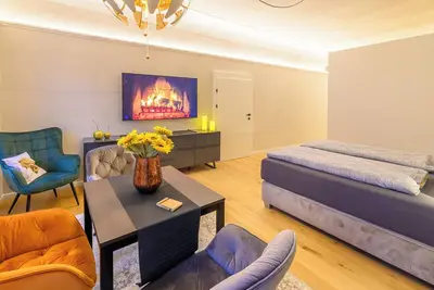 Image de Appartement \"Gasthof Alte Post Top 1 Kadett Suite\" avec vue sur les montagnes & Wi-Fi