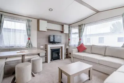 12ft-wide very comfortable and spacious caravan with one double and two twin.