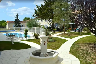 Image de Plume Gites de charme 4* avec Piscine, practice Golf et parc jeux enfants