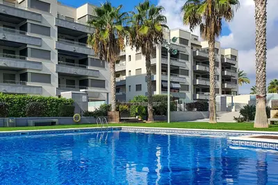 Image de At115 Nova Torredembarra: Apartamento con piscina comunitaria y una zona de juegos infantiles