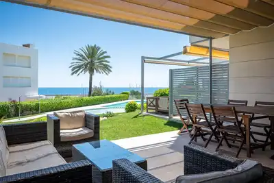 Image de At051 Vil. les de Mar: Casa adosada con piscina comunitaria y con vistas bonitas del puerto y del mar