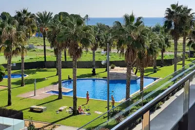 Image de At144 Nova Torredembarra: Apartamento con piscina a 250 de la playa