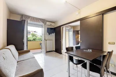 Image de Appartement \"Bilo 1piano in Villaggio\" avec jardin privé, piscines partagées & Wi-Fi