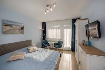 Image de Vacation apartment close to the beach in the Bernsteinbad Zempin, with Wlan, parking space and balcony.